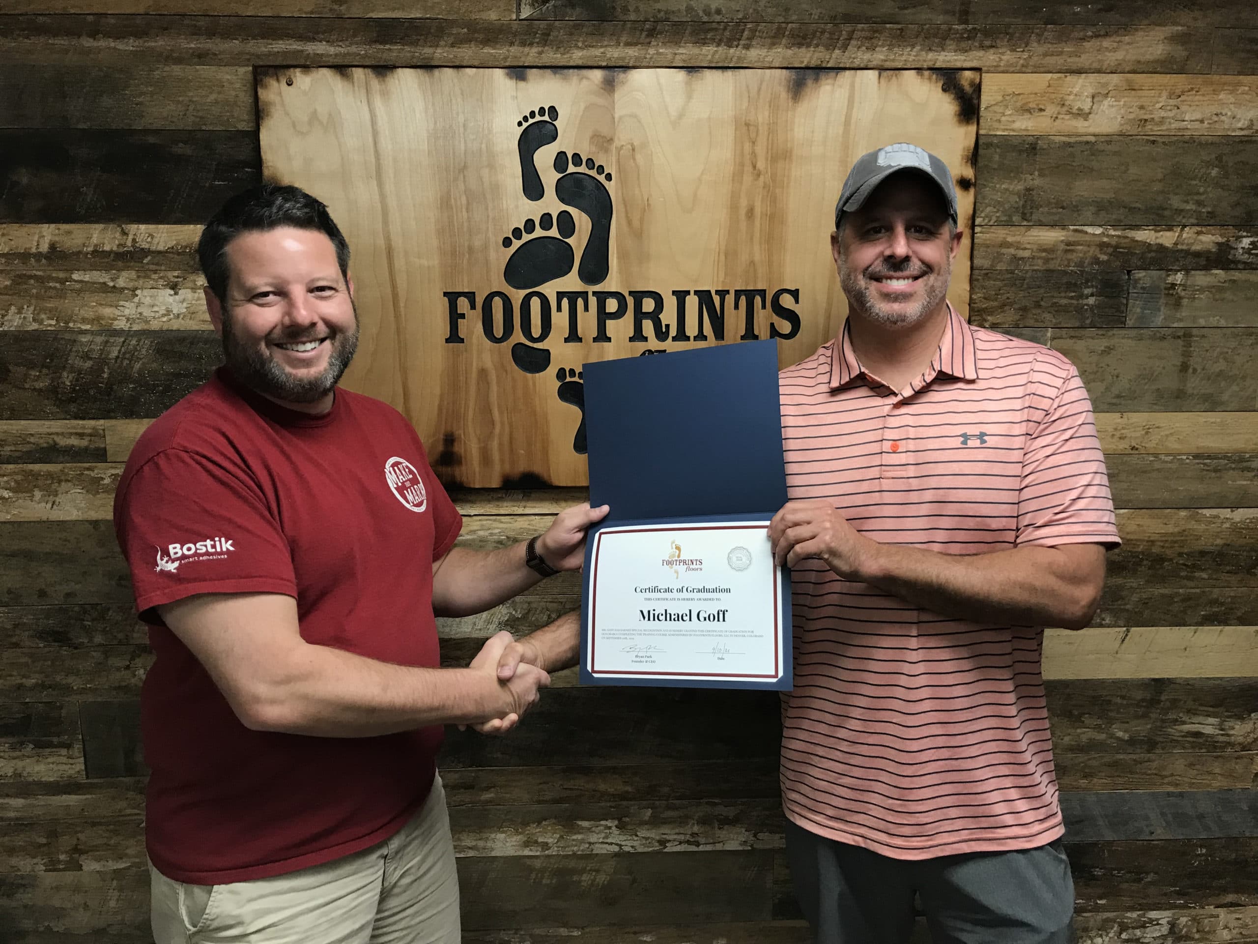 Footprints Floors flooring company for sale Franchise Owners celebrating their profitability.